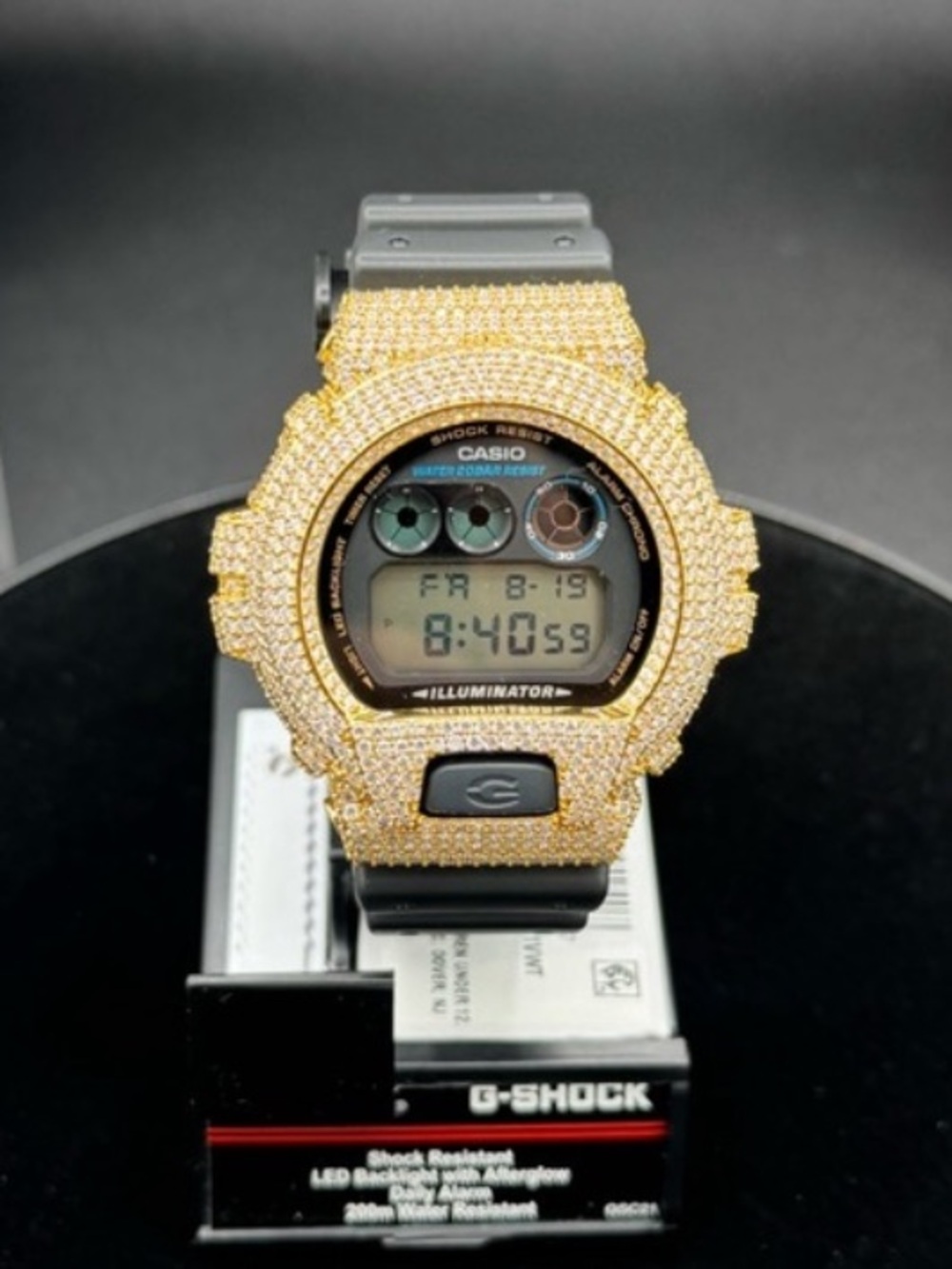 Casio G-Shock Digital Watch with Gold Jeweled Bezel and Black Strap